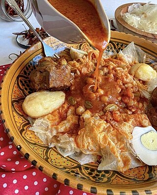 <span class="mw-page-title-main">Chakhchoukha</span> Algerian dish of torn bread and stew