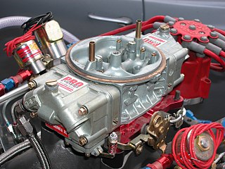 <span class="mw-page-title-main">Carburetor</span> Component of internal combustion engines which mixes air and fuel in a controlled ratio