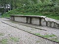 Rail tracks and platform at the entrance to the camp