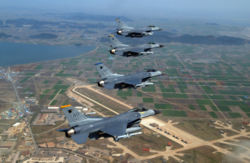 F-16C Fighting Falcons of the 8th Fighter Wing flying over Kunsan Air Base.