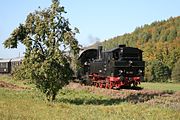 98 886 at Heufurt level crossing heading down the valley