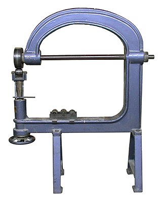 <span class="mw-page-title-main">English wheel</span> Metalworking tool for curving sheet metal