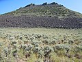 North slope with juniper above, and sagebrush in foreground