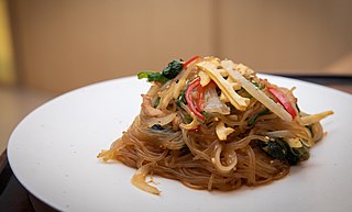 <span class="mw-page-title-main">Japchae</span> Korean dish of stir-fried glass noodles and vegetables