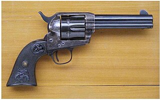 <span class="mw-page-title-main">Revolver</span> Firearm with a cylinder holding cartridges