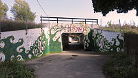 A painted viaduct located near Ken-Well Park.