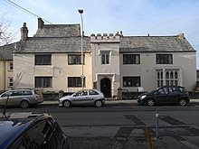 Old Vicarage, Barnstaple, built originally in 1311 "at the entrance of the Priory". The surviving building, entirely re-built "at his own great charge" by Rev Martin Blake (d.1673), Vicar of Barnstaple, (with 19th c. additions and restorations) today occupies the same site OldVicarage Barnstaple Devon.JPG