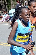 Peres Jepchirchir, elite women's winner, near the halfway point of the race