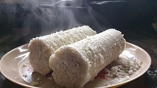 <span class="mw-page-title-main">Puttu</span> South Indian breakfast dish of steamed ground rice and coconut shavings