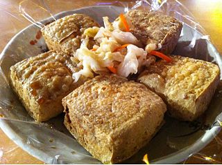 <span class="mw-page-title-main">Stinky tofu</span> Chinese fermented tofu with a strong odor