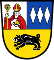 Gemeinde Ebermannsdorf Geteilt; oben gespalten von Silber und Blau, vorne ein wachsender, rot und silbern gekleideter hl. Nikolaus, der in der Rechten einen goldenen Bischofsstab und in der Linken ein schwarzes Buch mit drei goldenen Kugeln hält, hinten drei senkrechte, schwebende silberne Rauten, unten in Gold ein silbern bewehrter schwarzer Eber.