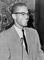 Image 14 Malcolm X Photo credit: Ed Ford, New York World-Telegram and Sun Malcolm X was an American Black Muslim minister and a spokesman for the Nation of Islam. Born Malcolm Little, he changed his surname to "X" as a rejection of his "slave name". Tensions between him and the Nation of Islam caused him to break from the group in 1964. He claimed to have received daily death threats and his house was burned to the ground in February 1965. One week later, Malcolm X was assassinated, having been shot in the chest by a sawed-off shotgun and 16 times with handguns. Three members of the Nation of Islam were convicted. More selected portraits