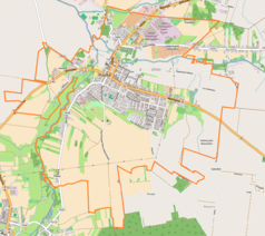 Mapa konturowa Praszki, u góry po lewej znajduje się punkt z opisem „Zawisna”