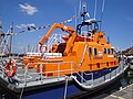 Stern quarter showing crane and inflatable boat stowed