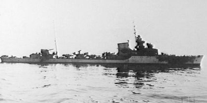 Starboard side view of the Italian destroyer Artigliere. The ship was stopped, abandoned and on fire forward after an engagement with the British cruiser HMS Ajax. The Artigliere was sunk by the cruiser HMS York on the following morning.