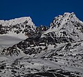 Mount Carmack on the right, as identified by the USGS. The true summit of the massif is on the left.