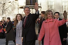 Hillary, Bill, and Chelsea walking the inaugural parade route Hillary Clinton Bill Chelsea on parade.jpg