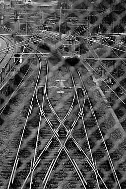 Train tracks as seen from the iron mesh in Stockholm,Sweden