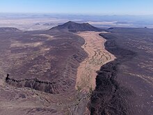 Hallat al-Badr with Thadra paleolake in foreground.