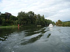 'Gin palace' heading downstream at Shiplake Hole - geograph.org.uk - 3713214.jpg