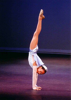 Handstand performed by acro dancer