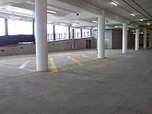 A modern parking undercroft beneath a cinema Carpark Cinema Undercroft Albany I.jpg