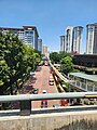 A view of the walkway from the BRT as it is being deconstructed, showing the remains of the Sunway Monorail.