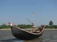 Planked fishing boat on the beach of Narikel Zinzira, Bangladesh