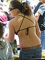 Image 111Woman wearing bikini top and jeans in USA, 2010. (from 2010s in fashion)