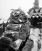 Wrecked vehicle aboard the battleship USS Nevada (BB-36) following the Crossroads Able atomic test, July 1946 (146763104).jpg