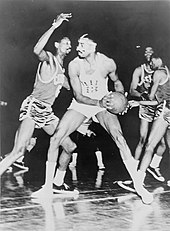 Bill Russell (left) has been selected to the All-NBA team 11 times. Wilt Chamberlain (center) has been selected to the All-NBA team 10 times. Wilt Chamberlain Bill Russell.jpg