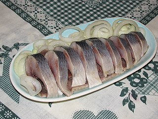 <span class="mw-page-title-main">Pickled herring</span> Traditional way of preserving herring