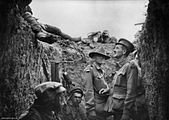 A trench at Lone Pine after the battle, showing Australian and Turkish dead on the parapet, 1915.