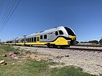 A DART Silver Line FLIRT DMU parked up at the under-construction Shiloh Road station in Plano, TX.