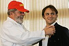 Massa received Medalha do Mérito Desportivo (Medal of the Sport Merit) by Luiz Inácio Lula da Silva, the president of Brazil. (24 October 2006)