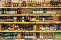 Image 10A display of various liquors in a supermarket (from Liquor)