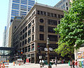 The original Dayton's department store in downtown. This building was featured in the The Mary Tyler Moore Show, and a bronze statue of Mary tossing her hat in the air (a famous image from the opening credits) stands in the foreground at the corner where it occurred.