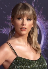 Color photograph of Taylor Swift at a music awards ceremony