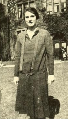 A young white woman, photographed outdoors