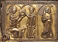 Lower left-hand panel with scribe handing a book shrine to a cleric