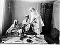 Ladies of the royal harem enjoying an Afghan meal.