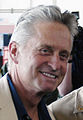 Michael Douglas poses for a photo with Chief Yeoman Randy Temple at Naval Air Station Sigonella, Sicily, June 19, 2004 (cropped)