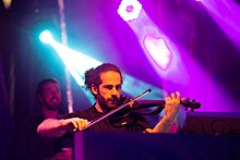 Paji playing an electric violin Paji SMS 2018-7.jpg