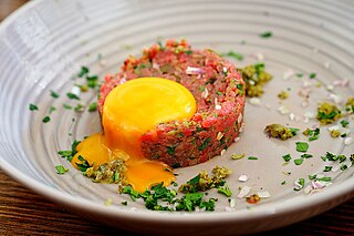 <span class="mw-page-title-main">Steak tartare</span> Starter dish composed of finely chopped raw meat