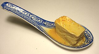 Fermented bean curd A Chinese condiment consisting of a form of processed, preserved tofu used in East Asian cuisine