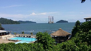 Thatched roof structures at the Limbe Beach