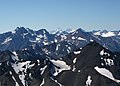 Image 31The Coast Mountains are heavily eroded by glaciers, including Mount Waddington (far background, center). (from Geology of the Pacific Northwest)