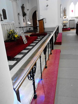 <span class="mw-page-title-main">Altar rail</span> Barrier or low rails in front of the altar of a church