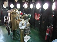 USS LST-325 ship's wheel and engine order telegraph, the latter also referred to in the US Navy as the lee helm