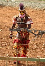 Serer wrestling. Rituals and regalia based on Serer tradition. See Senegalese wrestling Dakar-Marabout.jpg